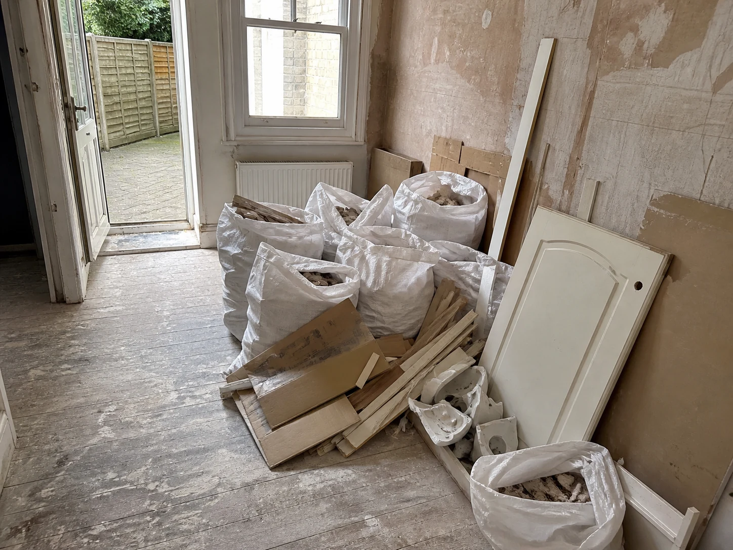 London renovation room before and after construction waste collection — before
