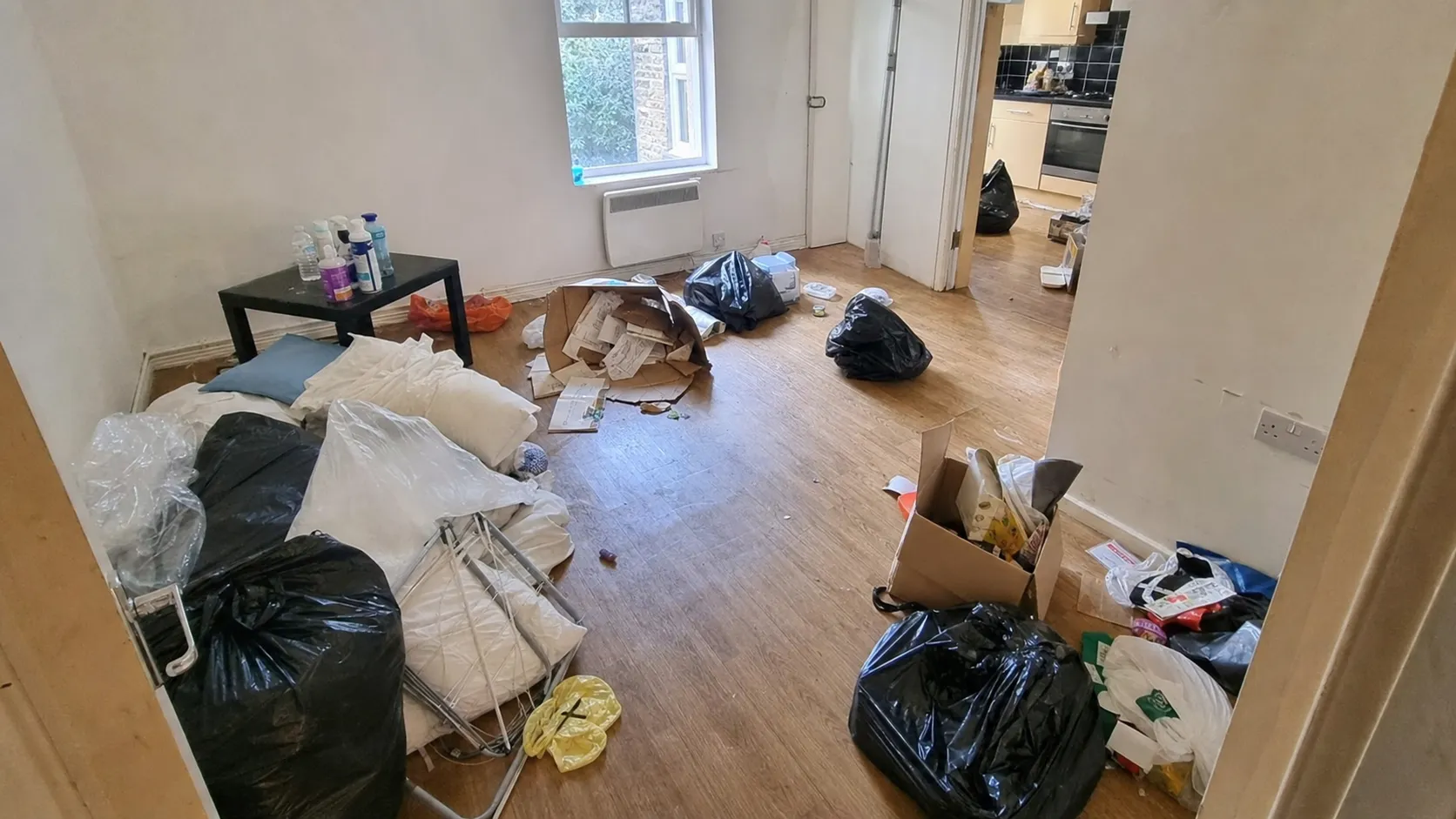 London flat before and after Oxload end-of-tenancy rubbish clearance — before