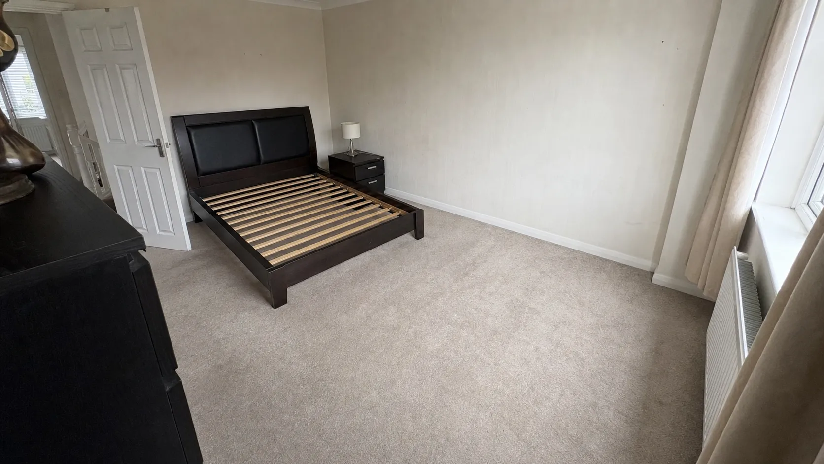London bedroom before and after Oxload mattress removal — after